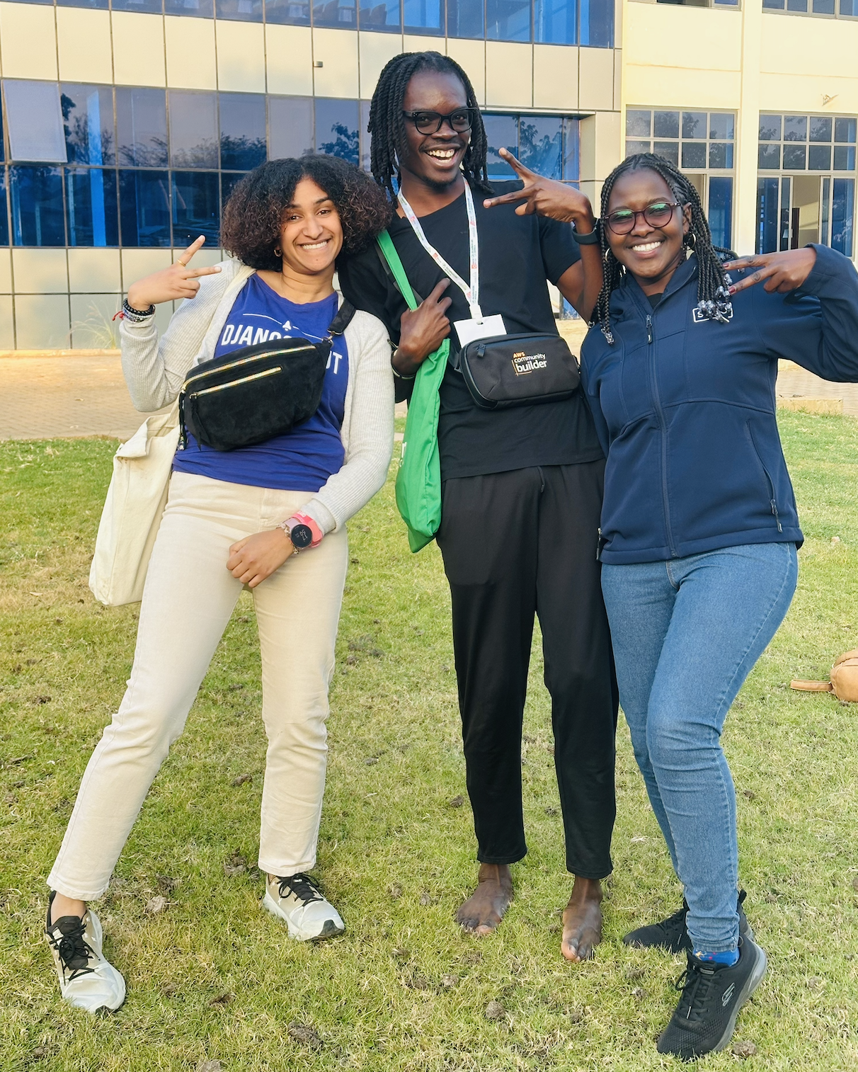 Sarah and Monica posing for a photo with a very famous comedian