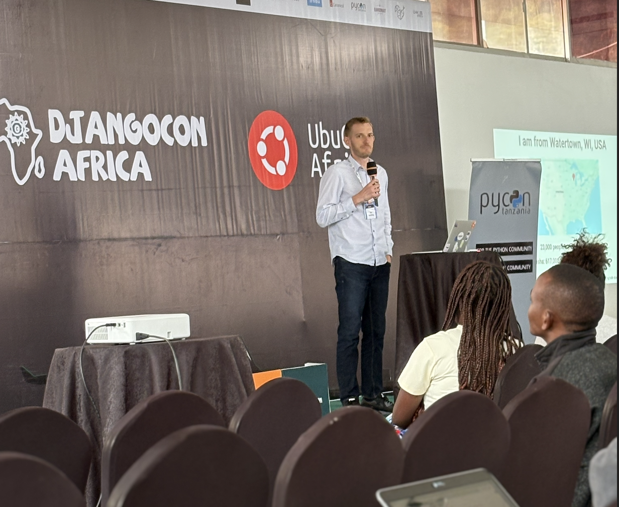 Tim, standing while talking. Proving that one can indeed kill two birds with one stone