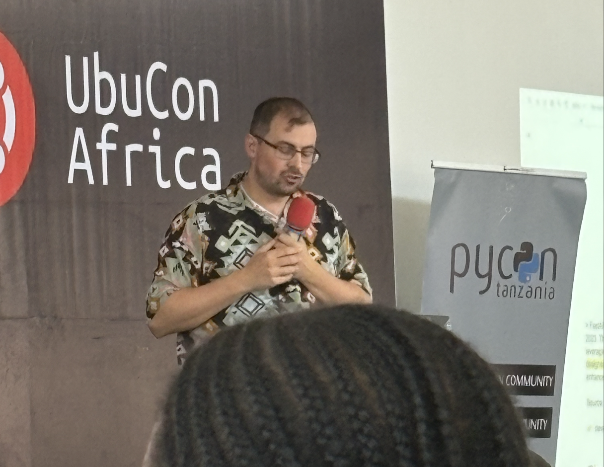 Thibaud, holding dearly to a red mic, the future of Django is safe