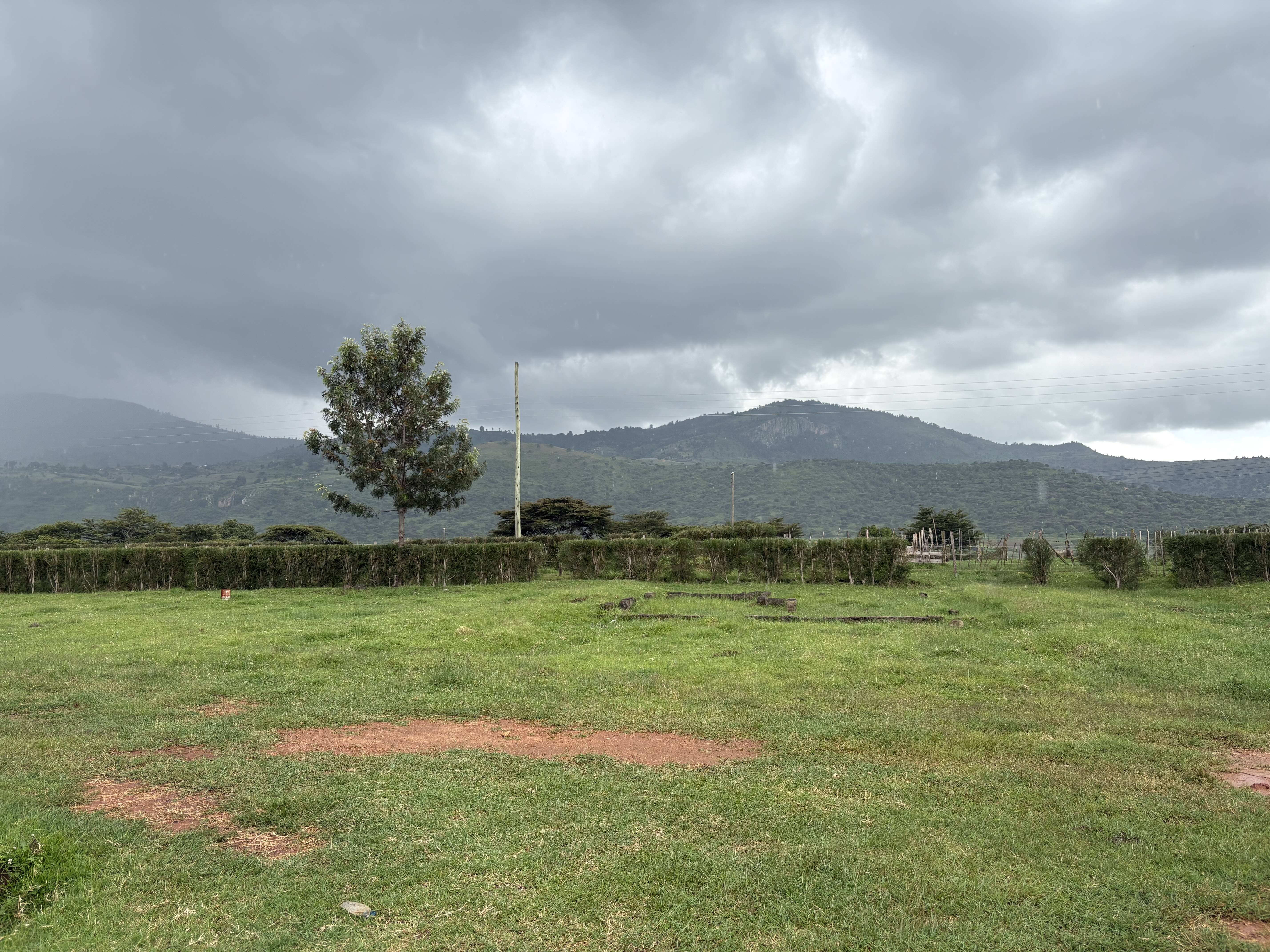 plain field, with some hills from a far.