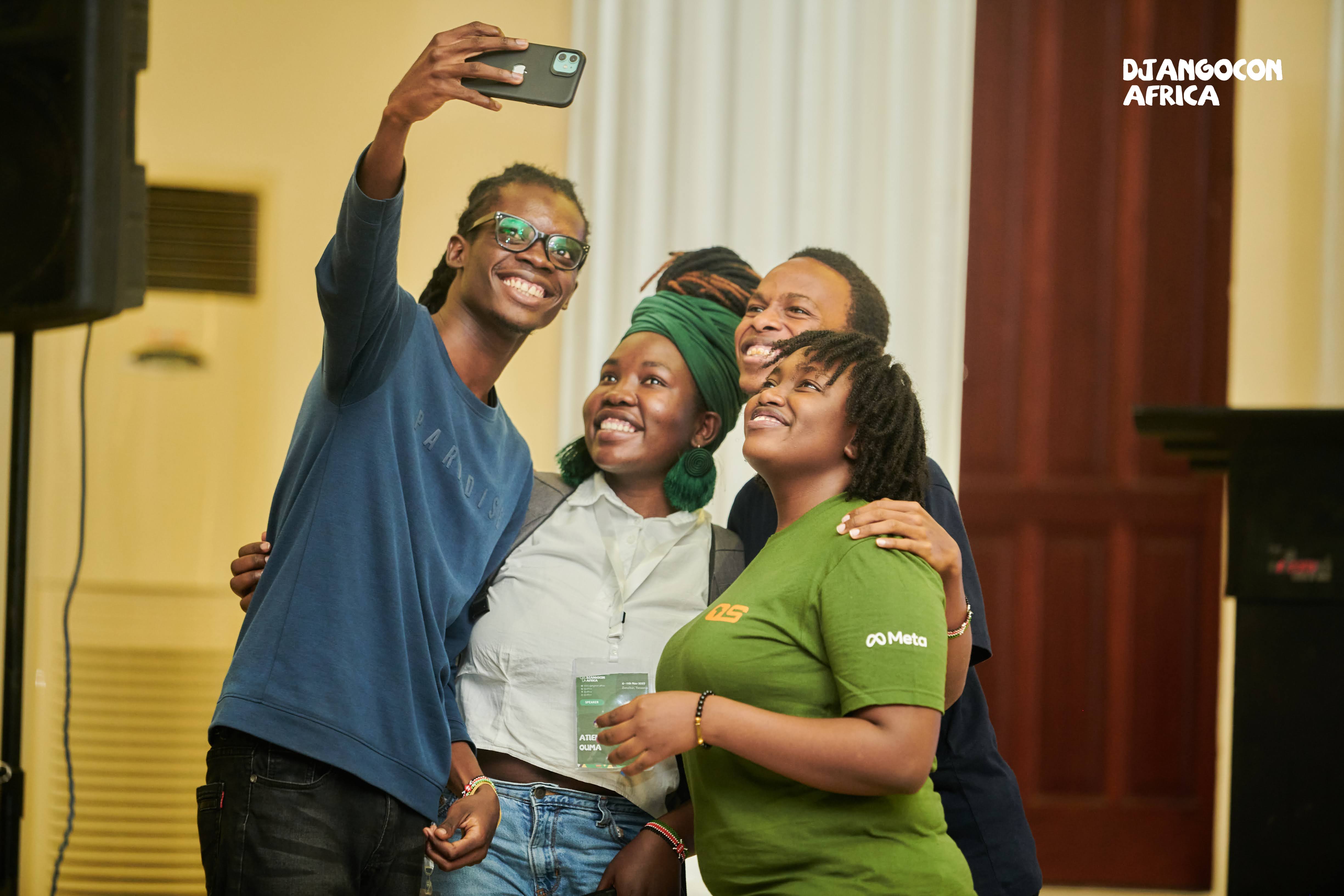 Group selfie during DjangoCon Africa with friends smiling toward the phone